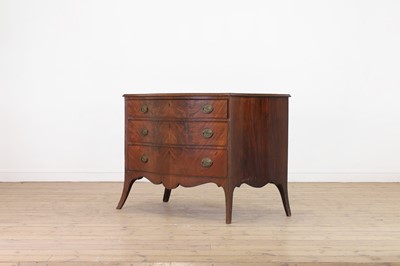 Lot 89 - A George III mahogany serpentine commode