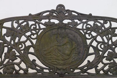 Lot 666 - A large Victorian-style cast iron garden bench