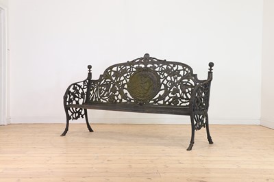 Lot 666 - A large Victorian-style cast iron garden bench