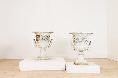 Lot 671 - A pair of Victorian painted cast iron urns