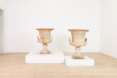 Lot 673 - A pair of Victorian painted cast iron urns