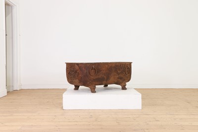 Lot 672 - A cast iron water trough