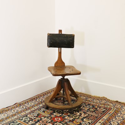 Lot 25 - An oak draughtsman or machinist's chair