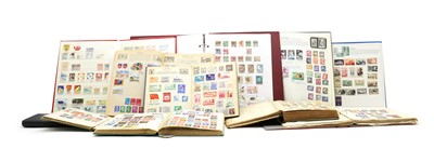Lot 407 - Twelve albums of stockbooks and loose
