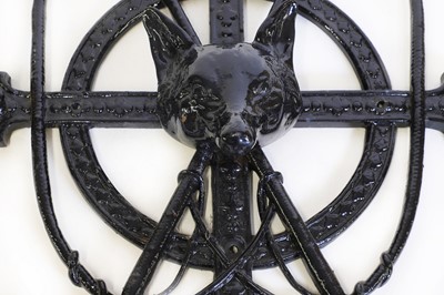 Lot 48 - A cast iron whip rack