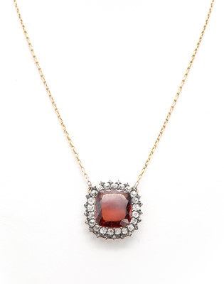 Lot 16 - A Georgian garnet and diamond cluster clasp