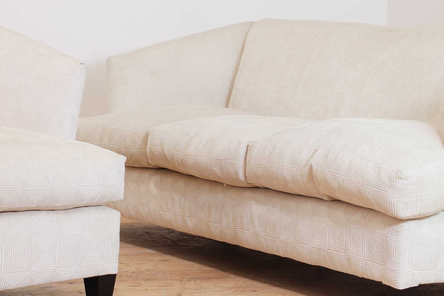 Lot 351 - A pair of three-seater sofas