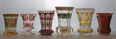 Lot 213 - A group of six Bohemian glass spa type beakers