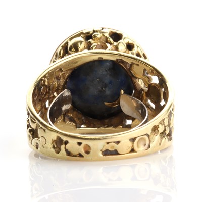 Lot 198 - An 18ct gold lapis lazuli and diamond ring, attributed to John Donald