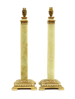 Lot 325 - A pair of onyx column table lamps