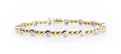 Lot 280 - An 18ct two colour gold diamond line bracelet