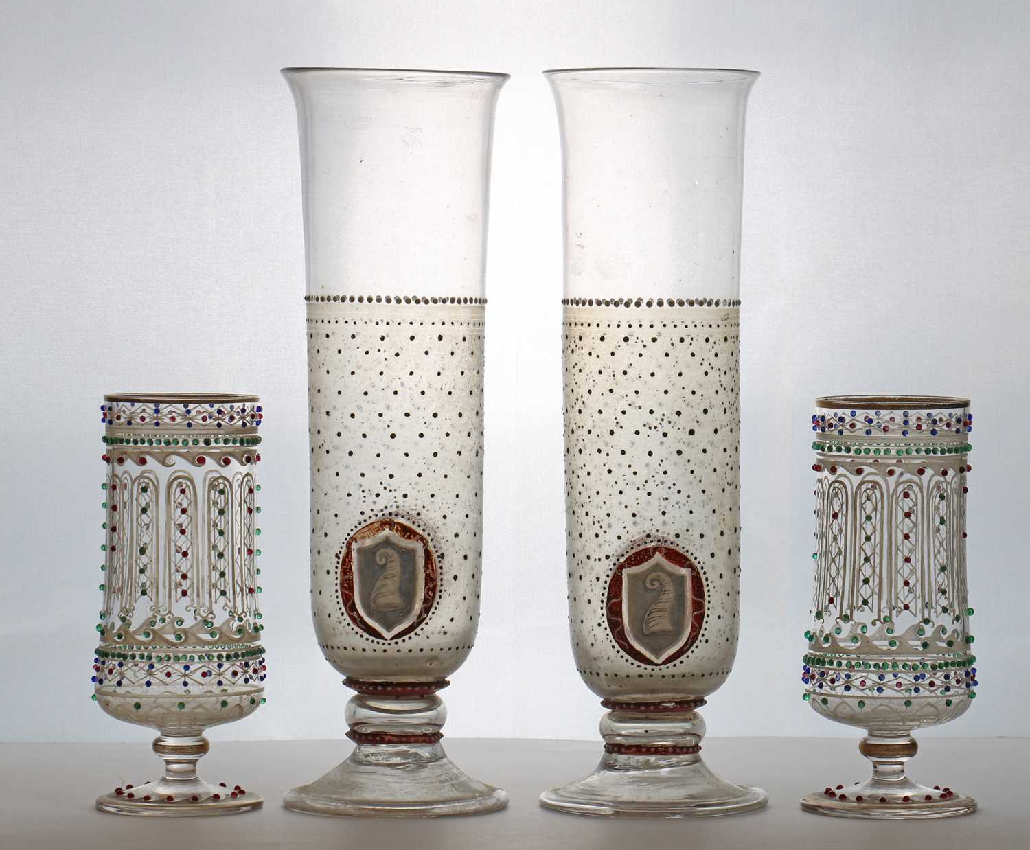 Lot 211 - A pair of footed glass vases