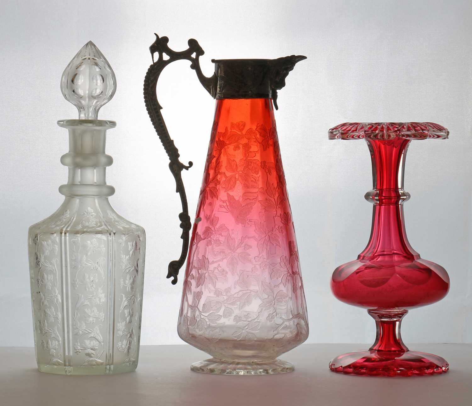 Lot 240 - An acid etched glass claret jug