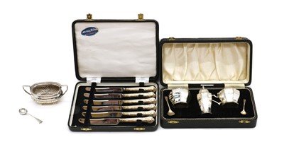 Lot 97 - A cased silver cruet set