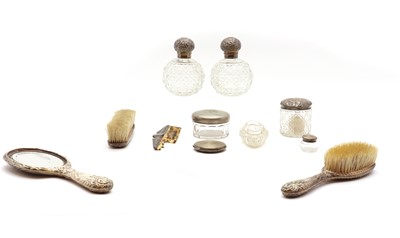 Lot 24 - A collection of silver dressing table items