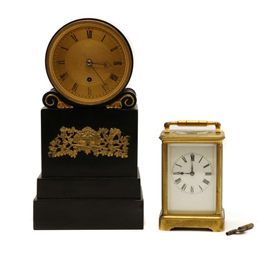 Lot 242 - A French Empire style slate mantel timepiece