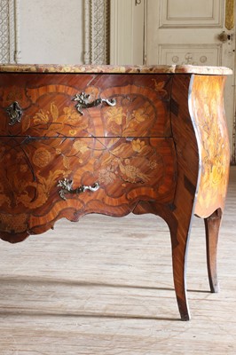 Lot 131 - ☘ A Louis XV floral marquetry bombé commode