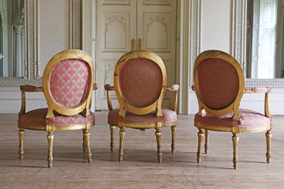 Lot 132 - ☘ A set of six giltwood open armchairs of Chippendale design