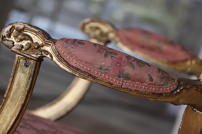 Lot 132 - ☘ A set of six giltwood open armchairs of Chippendale design