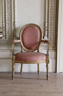 Lot 132 - ☘ A set of six giltwood open armchairs of Chippendale design