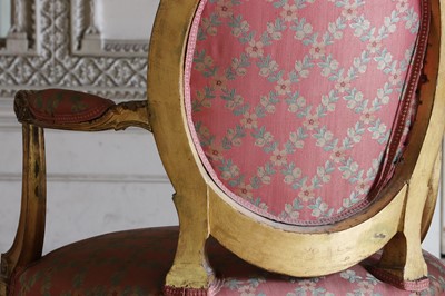 Lot 132 - ☘ A set of six giltwood open armchairs of Chippendale design