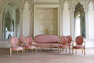 Lot 132 - ☘ A set of six giltwood open armchairs of Chippendale design