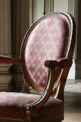 Lot 132 - ☘ A set of six giltwood open armchairs of Chippendale design