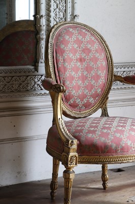 Lot 132 - ☘ A set of six giltwood open armchairs of Chippendale design