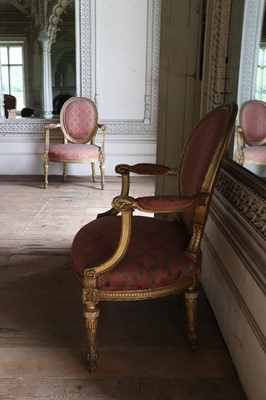 Lot 132 - ☘ A set of six giltwood open armchairs of Chippendale design