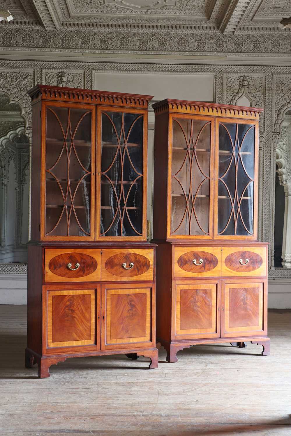 Lot 36 - ☘ A pair of late George III satinwood secretaire cabinets