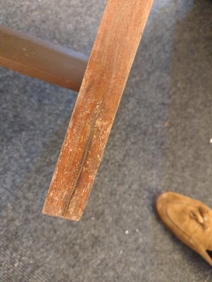 Lot 234 - A teak paddle armchair
