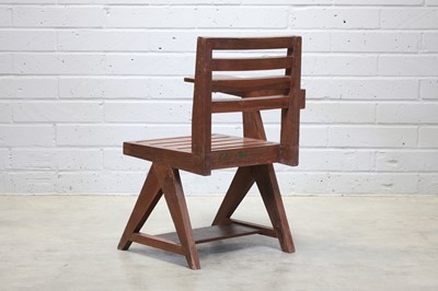 Lot 234 - A teak paddle armchair