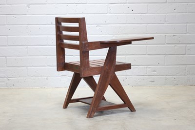 Lot 234 - A teak paddle armchair