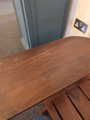 Lot 234 - A teak paddle armchair
