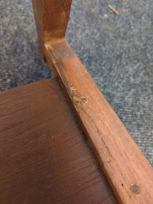 Lot 234 - A teak paddle armchair