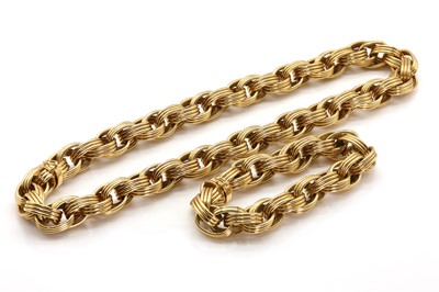 Lot 113 - A gold oval link necklace and bracelet suite, by Tiffany & Co.