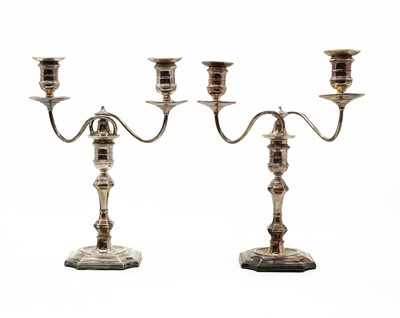 Lot 19 - A pair of silver twin-light candelabra