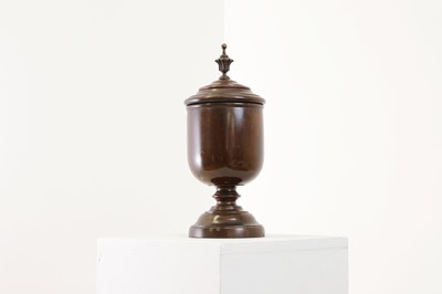 Lot 497 - A lignum vitae wassail cup and cover