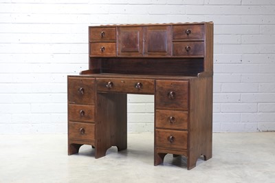 Lot 128 - An Arts and Crafts walnut desk