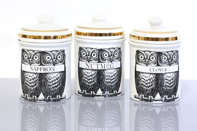 Lot 318 - An Italian Fornasetti group of three porcelain owl storage jars or canisters