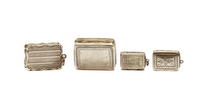Lot 32 - A group of four silver vinaigrettes