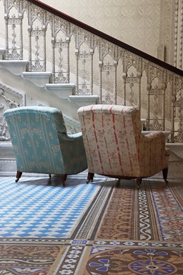 Lot 148 - ☘ A pair of 'Bridgewater' armchairs by Howard & Sons Ltd.