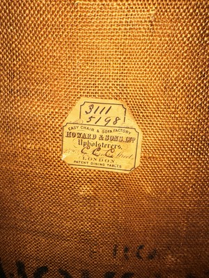 Lot 148 - ☘ A pair of 'Bridgewater' armchairs by Howard & Sons Ltd.