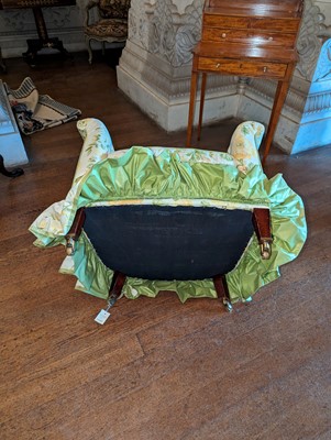 Lot 18 - A button-upholstered tub chair by Howard & Sons