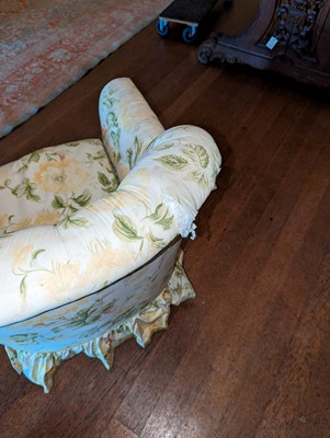 Lot 18 - A button-upholstered tub chair by Howard & Sons