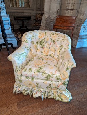 Lot 18 - A button-upholstered tub chair by Howard & Sons