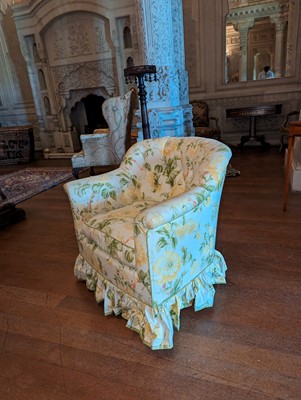 Lot 18 - A button-upholstered tub chair by Howard & Sons
