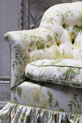 Lot 18 - A button-upholstered tub chair by Howard & Sons