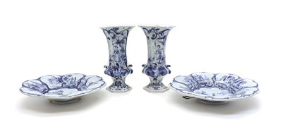 Lot 76 - A pair of Royal Tichelaar Makkum Delft pottery chargers