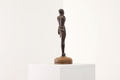 Lot 252 - An ancient Egyptian carved wooden figure in the Middle Kingdom-style